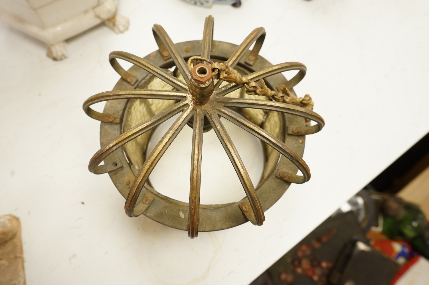 A brass and glass hanging ‘crown’ ceiling pendant, 20cm diameter